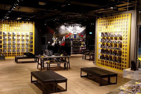 Interior of Dr Martens, Oxford Street, showing changing area and footwear on display